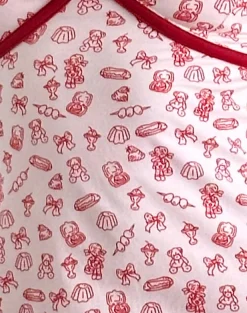 Motel Rocks Printed Dresses | Day Dresses-Dimaya Mini Dress in Girlie Print with Red Binding
