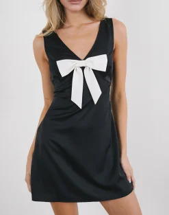 Motel Rocks Basics | Little Black Dresses-Faradiba Mini Dress in Satin Black with Ivory Bow