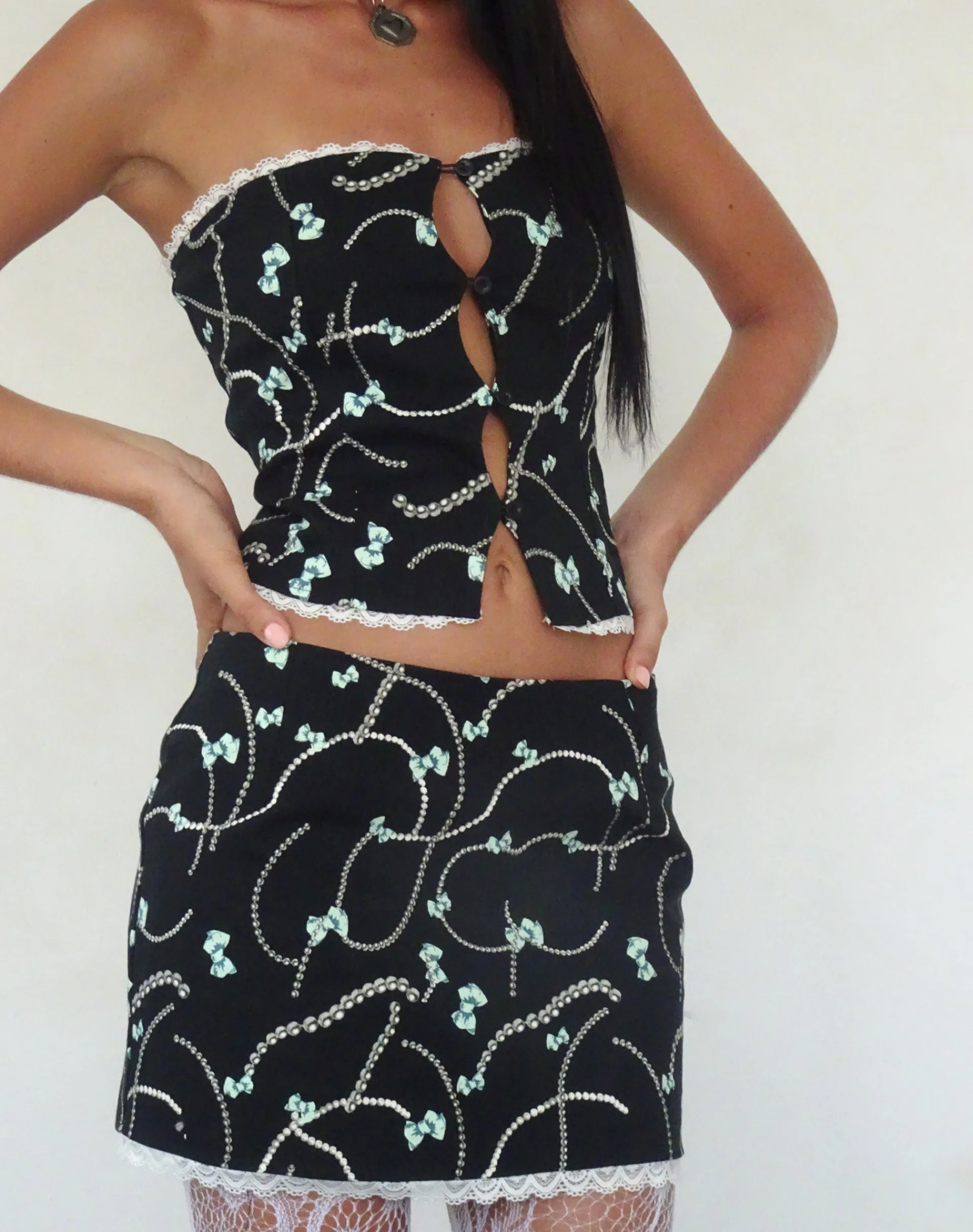 Motel Rocks Co-Ords | Printed Tops-Lacur Bandeau Corset in Black with Pearl and Bow Print