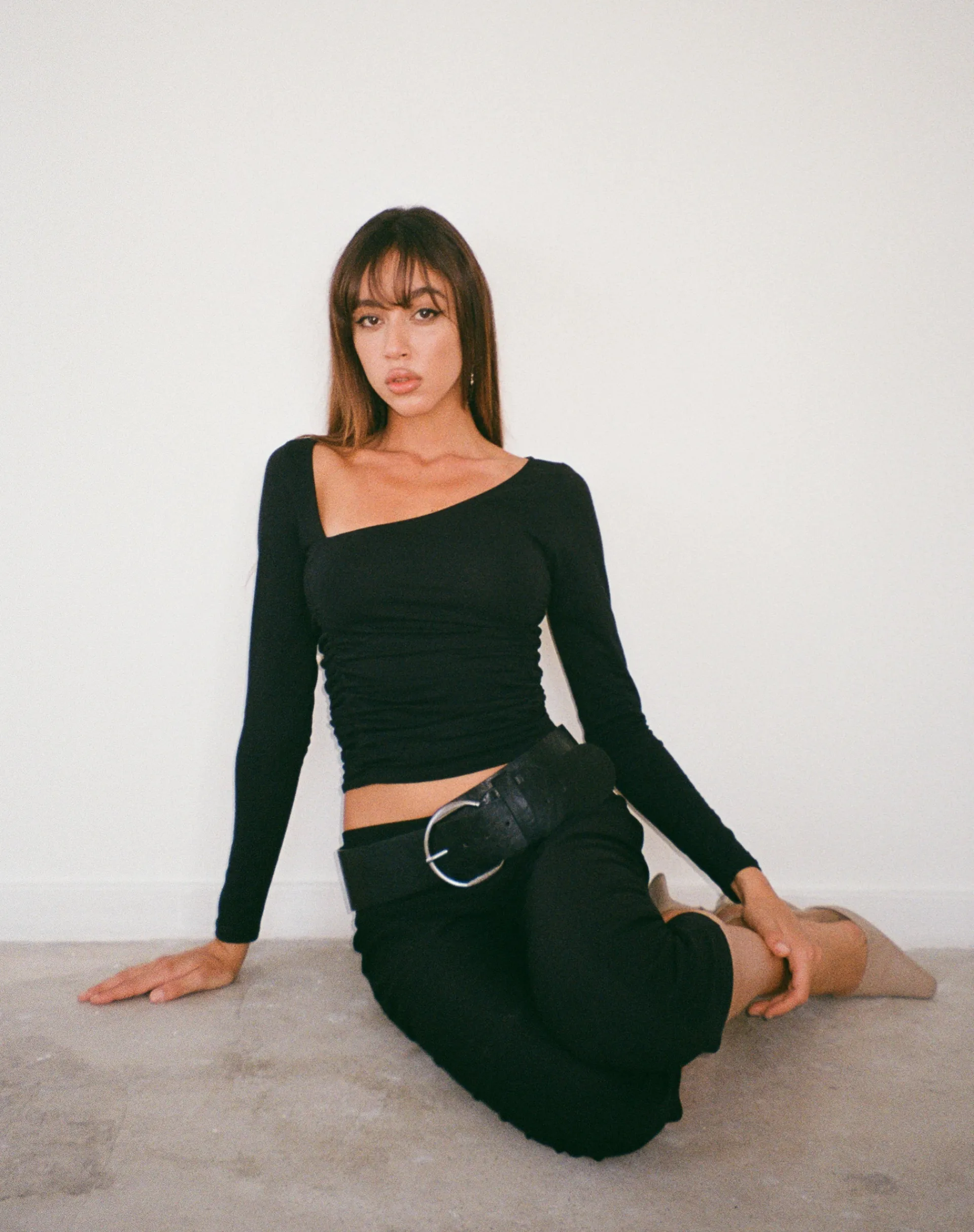 Motel Rocks Basics | Basic Tops-Sunbee Ruched Asymmetric Long Sleeve Top in Black